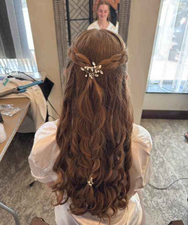 Long brunette half-up hairstyle with cascading curls