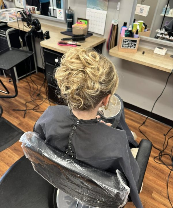 Blonde curled updo viewed from behind