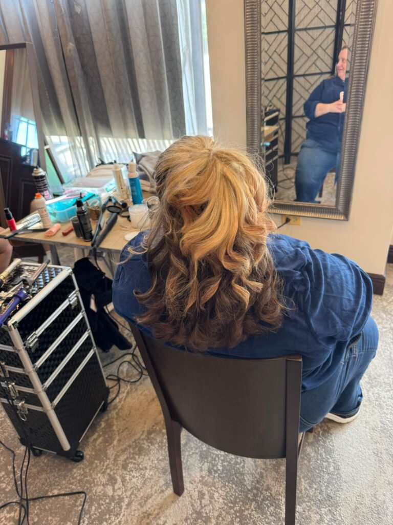 Blonde curls styled for a special occasion