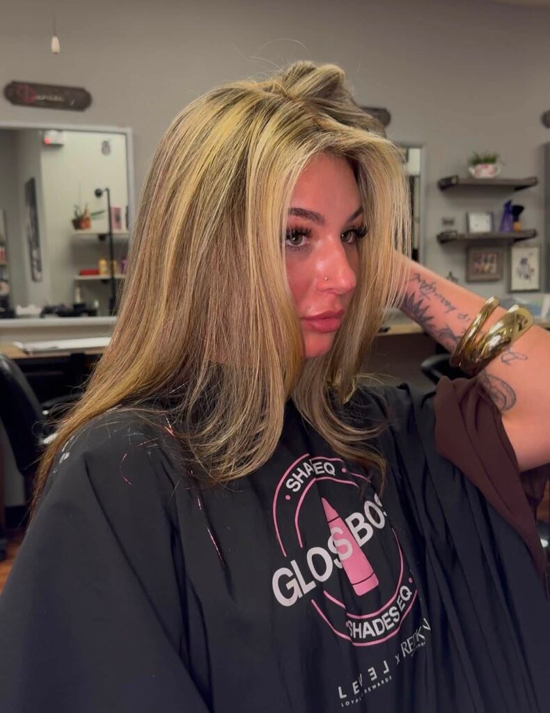 Dimensional blonde hair with face-framing layers