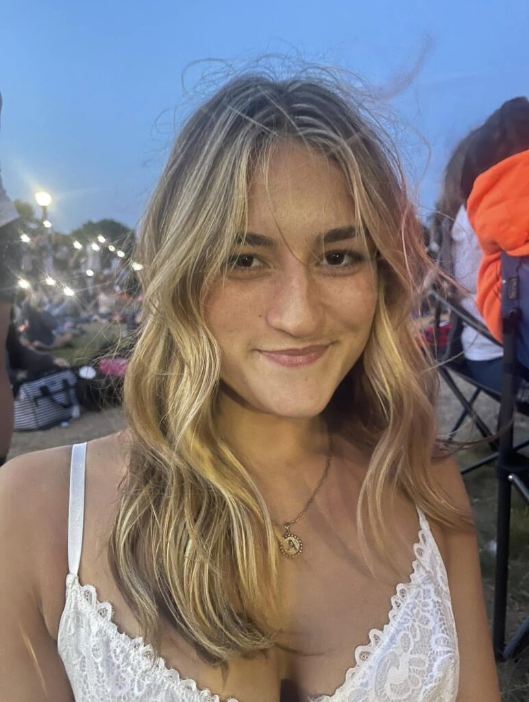 Blonde waves with face-framing highlights