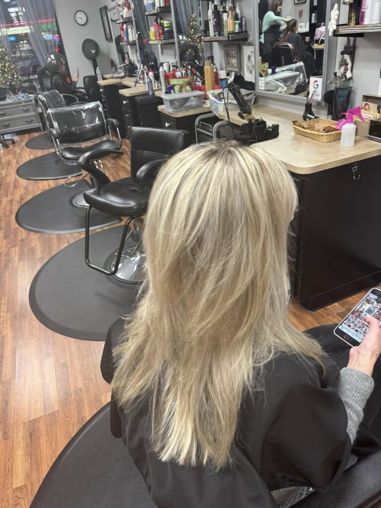 Blonde layered hair at the salon